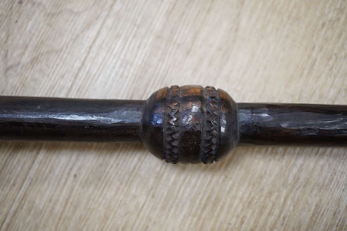 A Nigerian tribal ebony staff, 169cm long